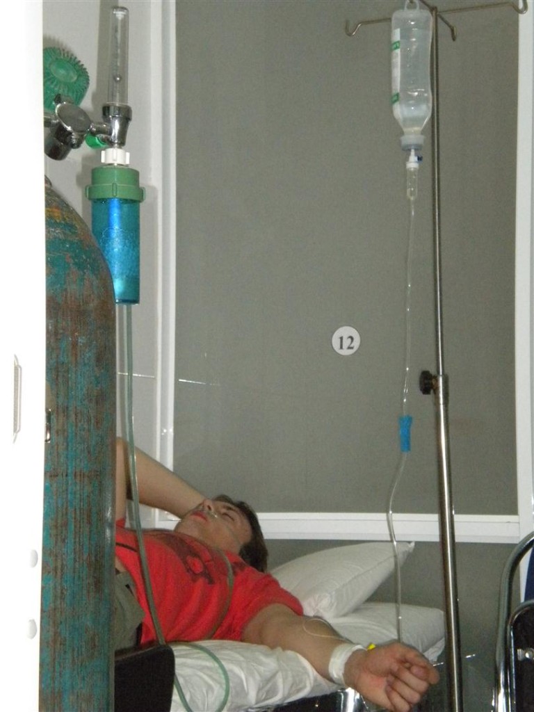 Chris in hospital bed